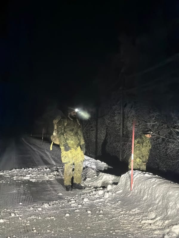 Vehicle overturns in snowy Norway, soldiers respond during aurora