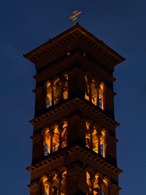 Historic stone tower photographed at twilight in St. Moritz