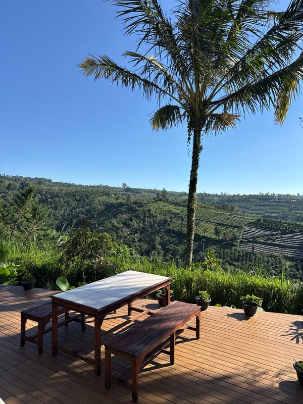 Tourist documents scenic mountain resort stay in Petang, Indonesia