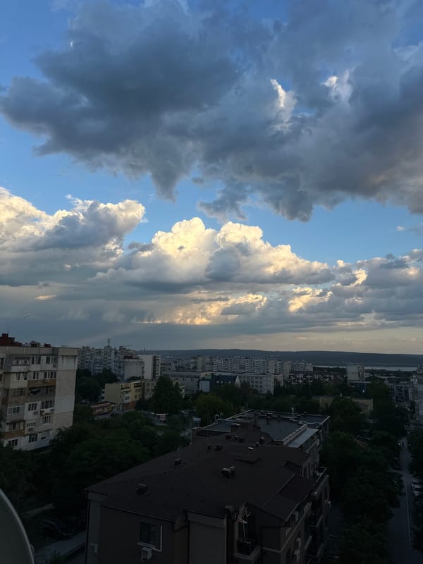 Rainbow and dramatic clouds observed over Varna cityscape