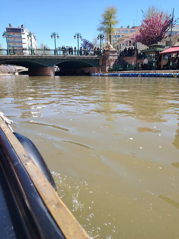 Boat journey documented along Eskisehir waterfront under sunny skies