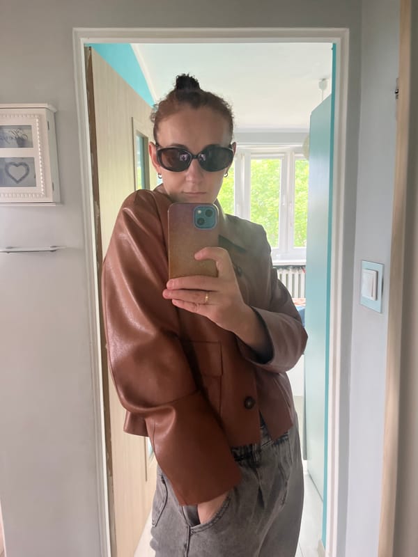 Woman documents afternoon urban walk with selfies and streetscapes