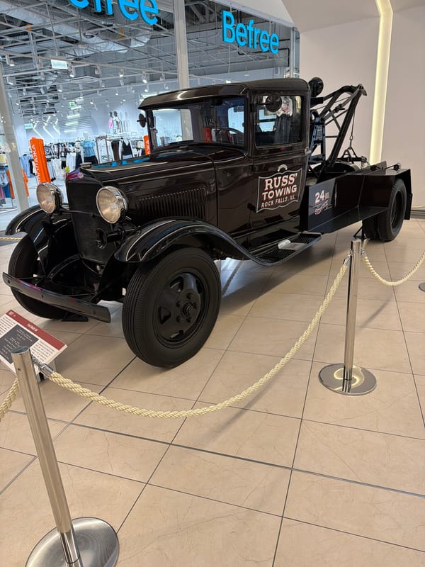 Vintage Ford AA tow truck on indoor display