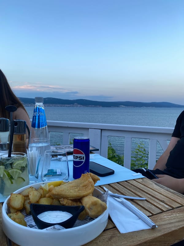 Fish and chips at a breezy seaside table