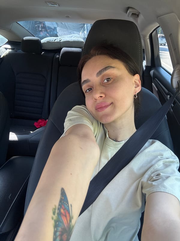Driver with butterfly tattoo spotted in car in Tbilisi