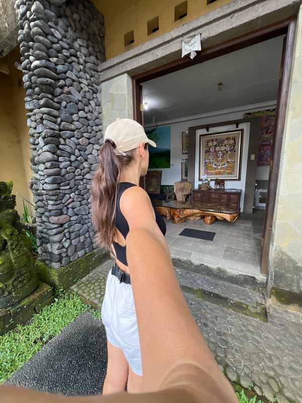 Woman explores Ubud markets and streets in early morning