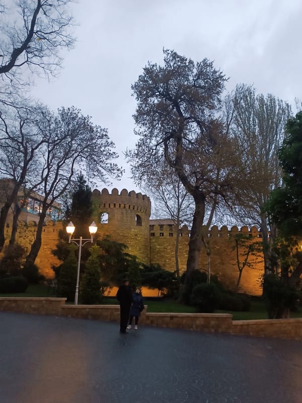 Evening scenes captured across illuminated Baku landmarks and parks