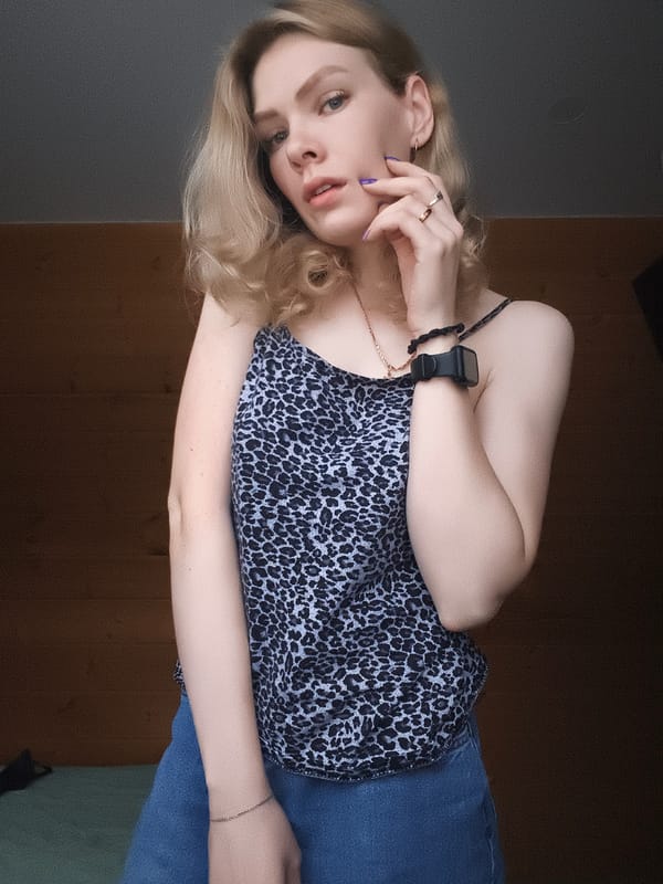Woman takes selfies indoors in rural Russia