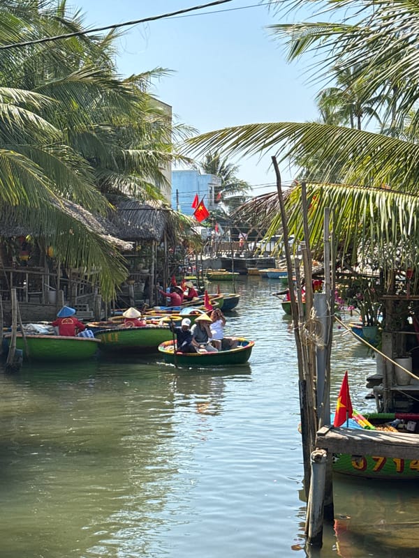 Colorful traditional coracle boats docked in Đà Nẵng waterway