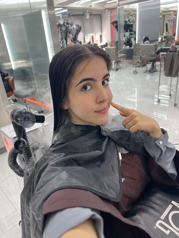 Woman receives hair treatment at Seoul salon early morning