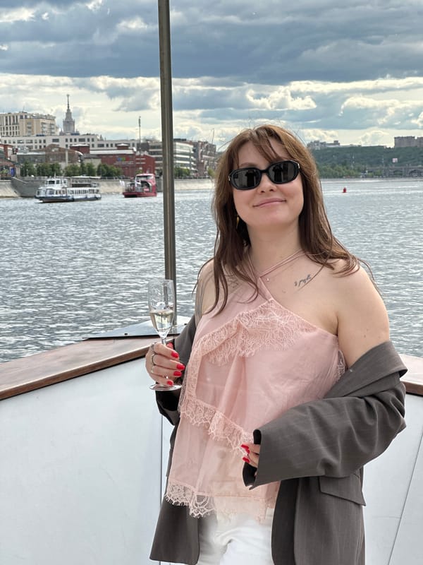Woman enjoys champagne cruise on Moscow river