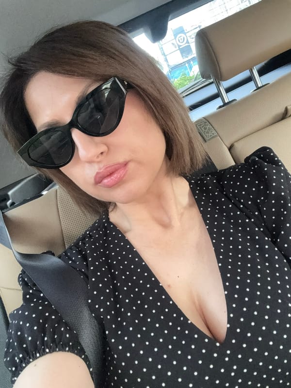 Woman takes early morning car selfies in Sofia