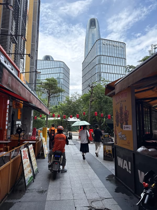 Haizhu District streets and storefronts on a quiet weekday morning