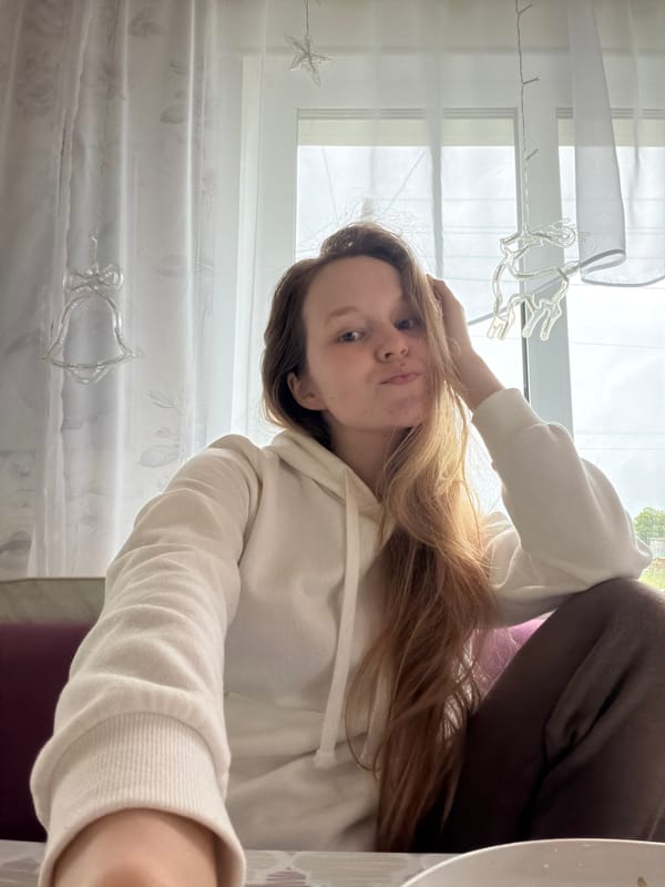 Showing off ornate eye earrings and strawberries at home in Кадряково