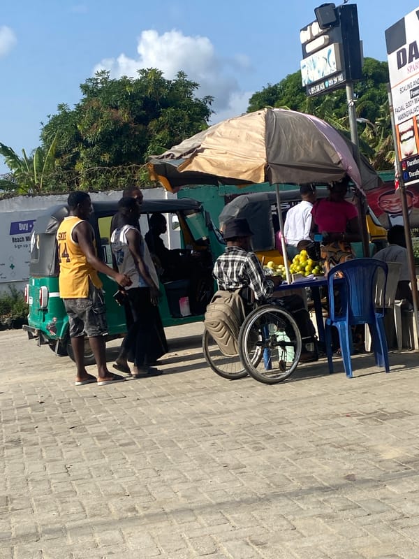 Street vendors operate mobile businesses in Ado, Nigeria