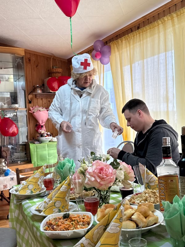 Nurse and companion share meal in Russian town