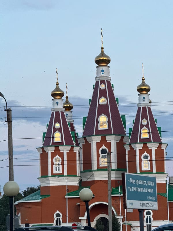 Evening stroll through Otradny: church, gardens, and dogs