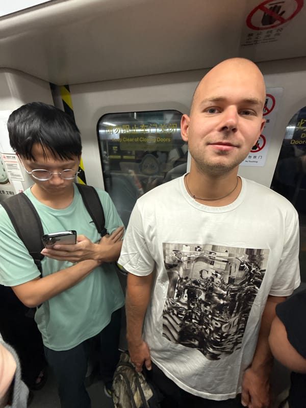 Late-night commuters ride crowded Guangzhou Metro in Tianhe District
