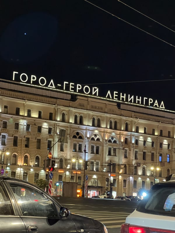 Neon 'Hero City Leningrad' sign lights up a Saint Petersburg building