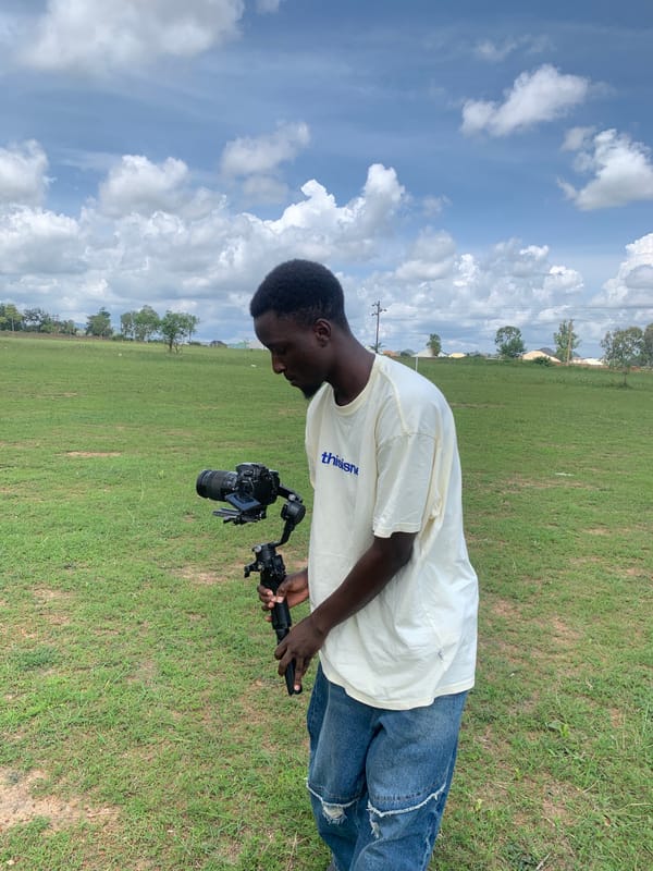 Camera crew works an open field shoot in Jos, Nigeria