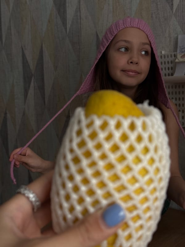 Woman poses with money, child with items in Votkinsk