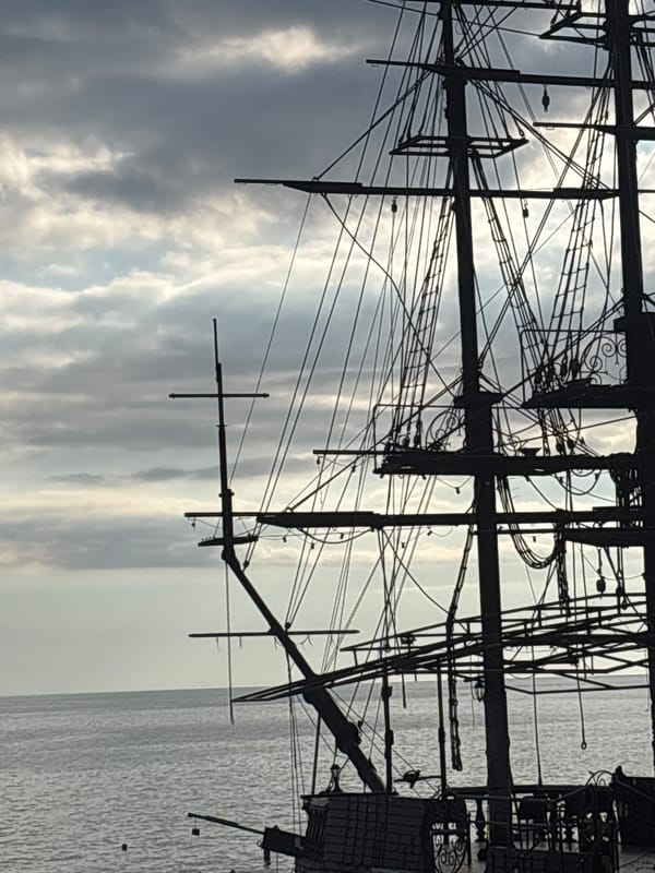 Sochi waterfront on a summer afternoon — ships, beach, promenade