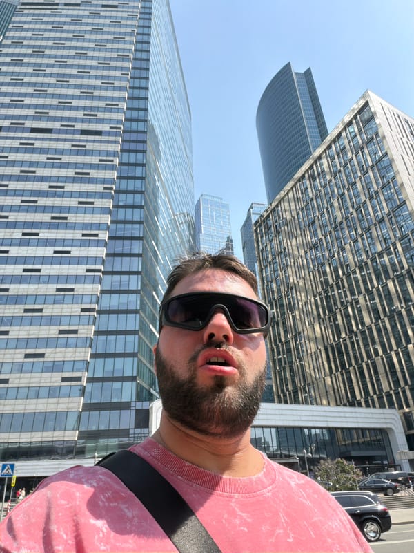 Man takes selfie amid modern buildings in Khimki
