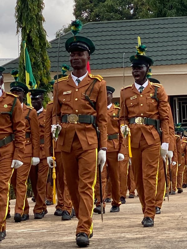 Uniformed formation marches in ceremony, Kaduna, Nigeria
