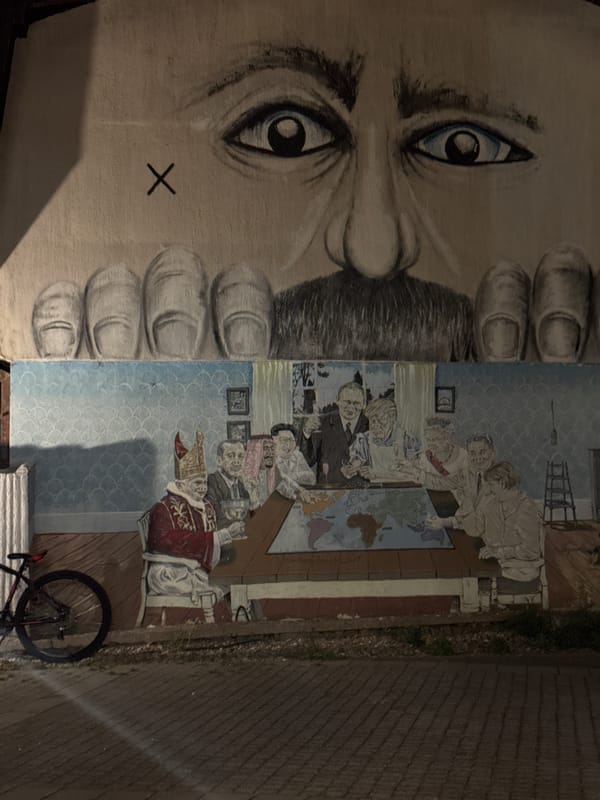 Night mural in Zvezdara: big face, mustache, hands