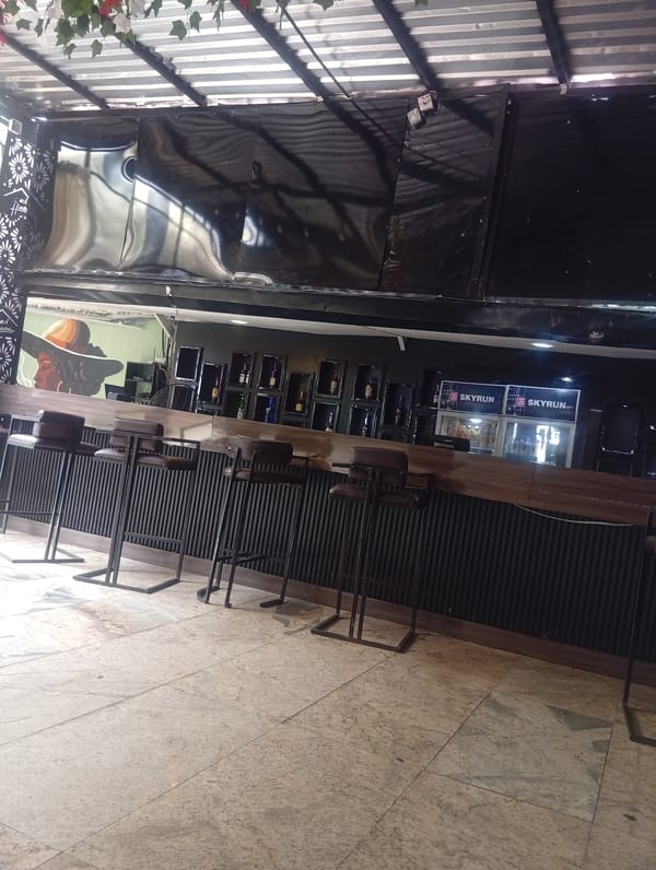 Bar and murals in Howayi, Nigeria on a quiet morning