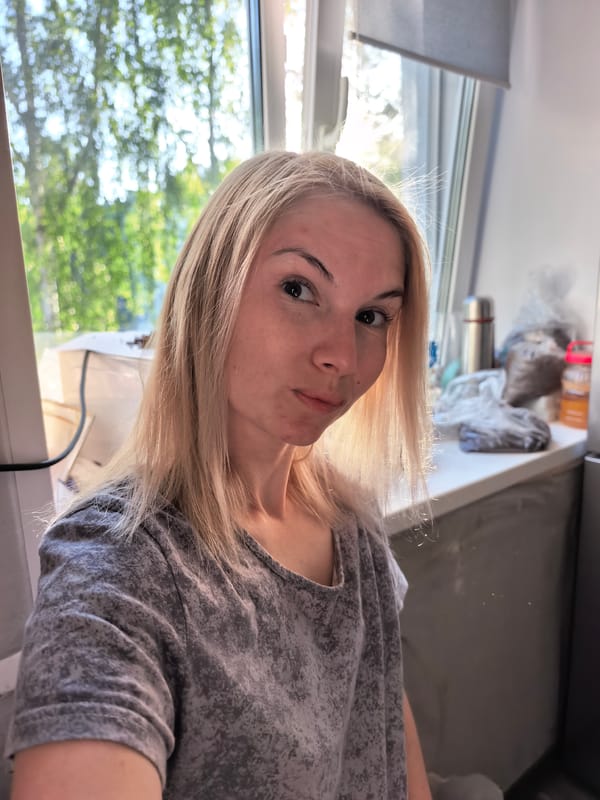 Woman takes selfies in Sterlitamak apartment early morning
