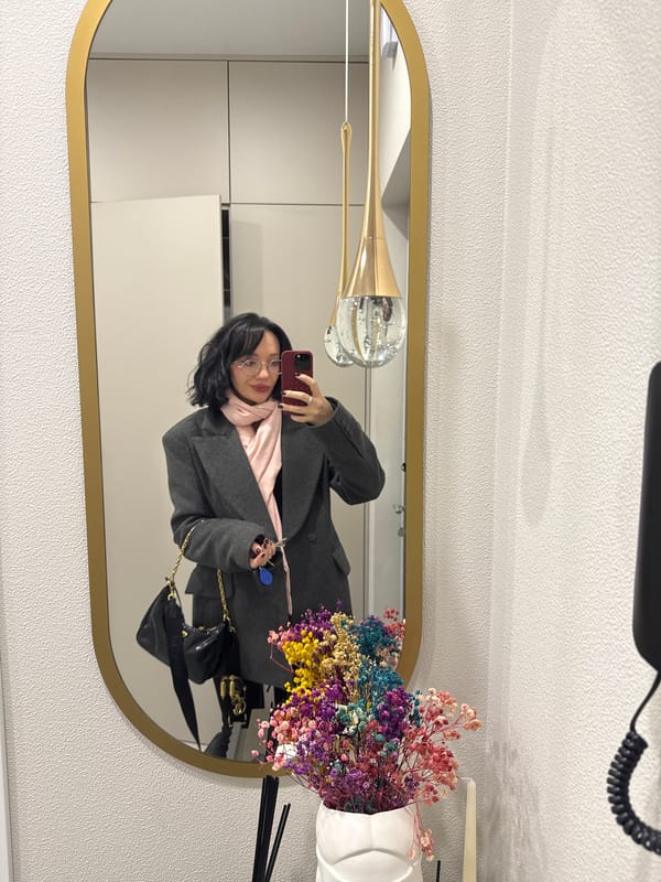 Woman takes mirror selfie in Saint Petersburg building