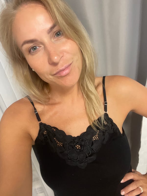Woman takes hotel room selfies in Baranovka, Russia