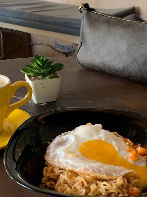 Noodles, fried rice, and coffee at a Denpasar café
