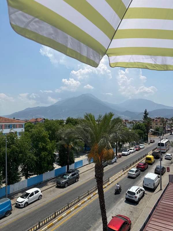 Lazy Sunday morning on a Fethiye balcony with mountain views