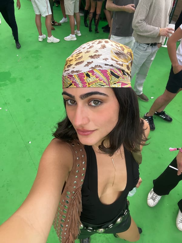 Woman takes selfie in outdoor Madrid gathering