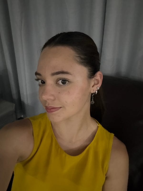 Woman takes selfie indoors in Santa Clara Ocoyucan, Mexico