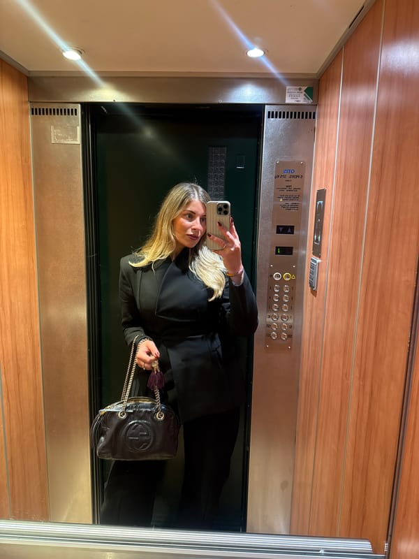 Woman takes elevator selfie in Paris