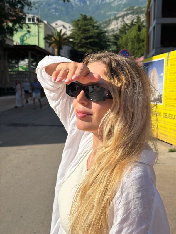 Sun, storms, and street life across an afternoon in Budva