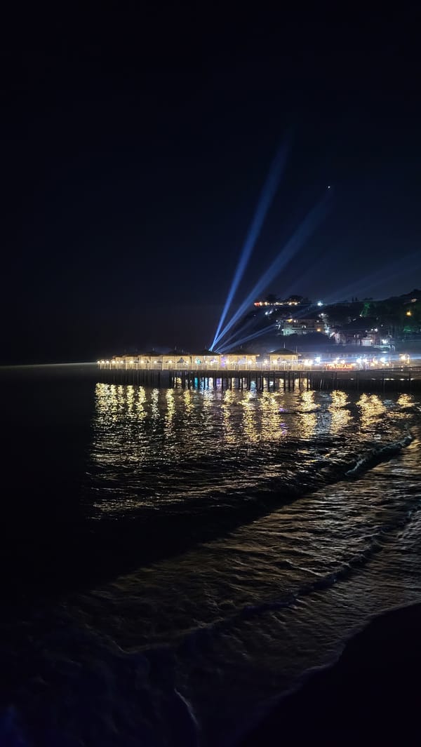 Full moon night along Alanya's lit waterfront pier