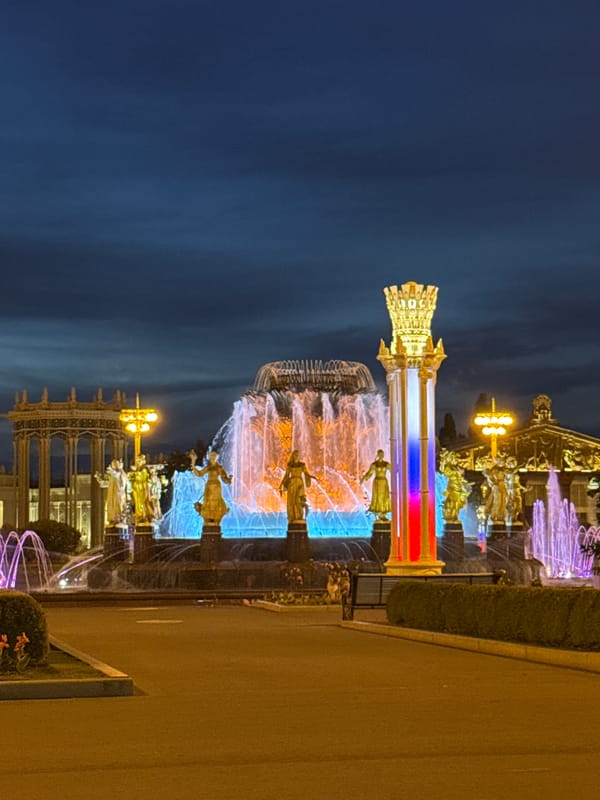 VDNKh and its famous fountain glowing on a Moscow evening