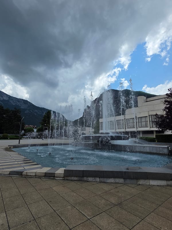 Tourist documents Vratsa city landmarks during morning walkthrough