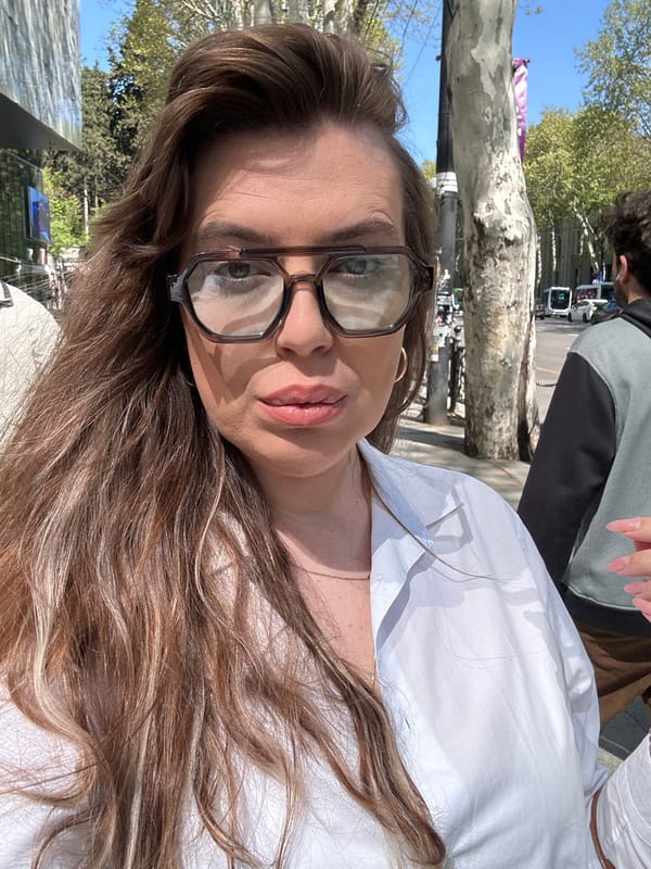 Woman takes morning selfies in downtown Tbilisi