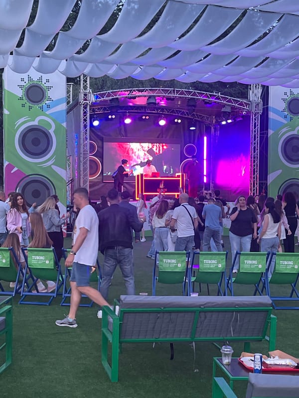 Evening outdoor event documented on Trukhaniv Island, Kyiv