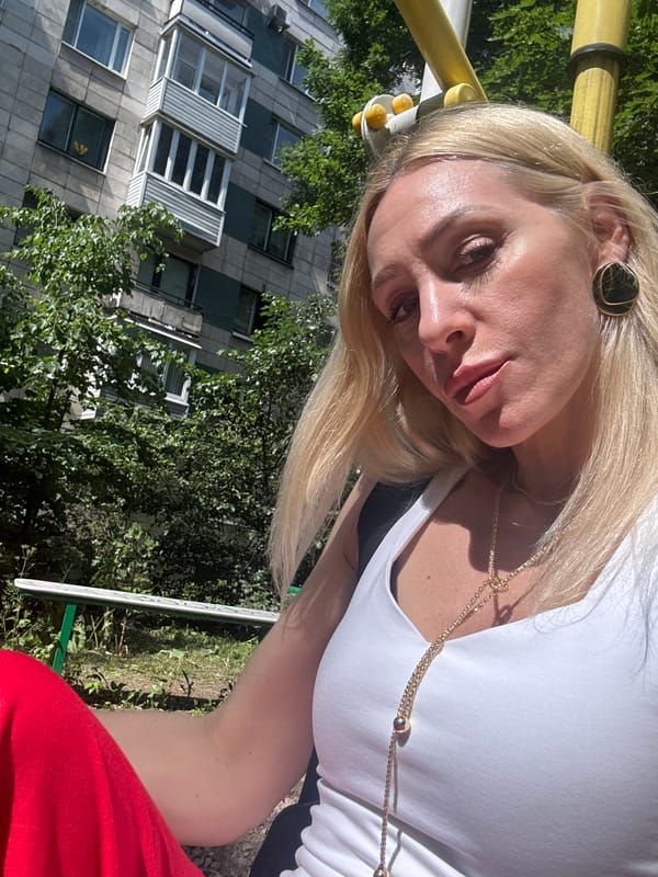 Selfies and outdoor gym time at a casual urban park