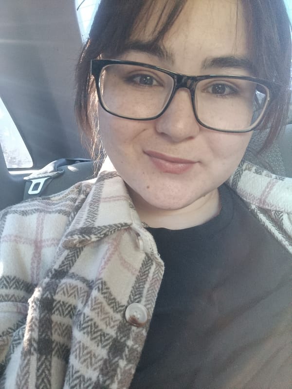 Woman takes selfie in car in Noviy, Russia