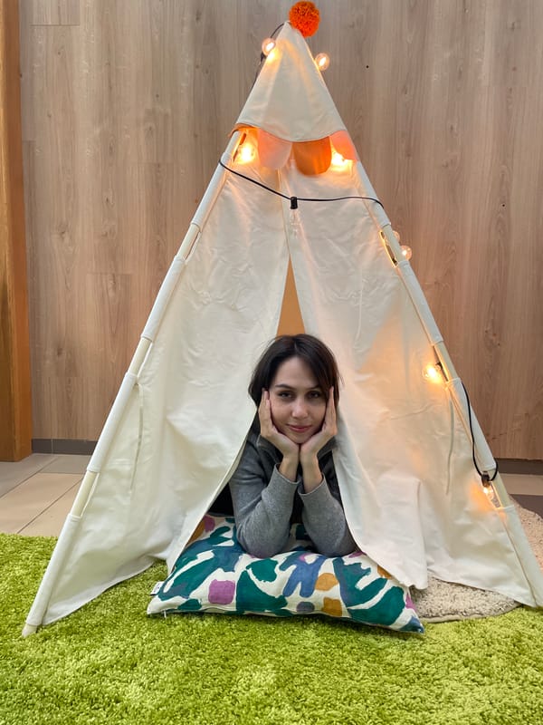 Woman uses tomatoes as eye covers on couch in Izhevsk