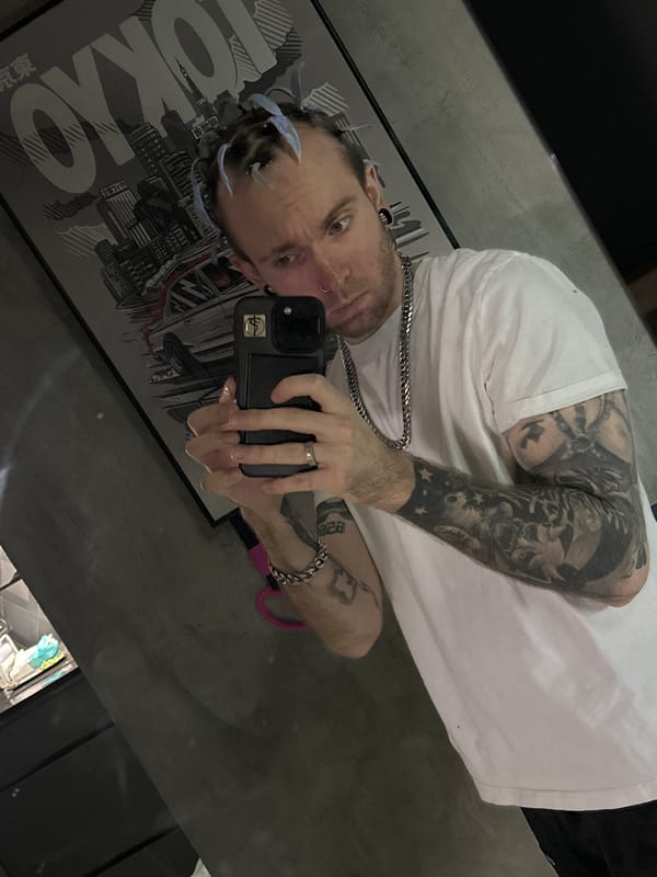 Tattooed man takes selfie in Khimki