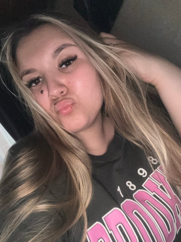 Woman takes selfies in Russian village wearing Brooklyn shirt