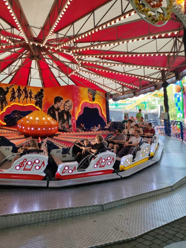 Summer afternoon at Gorky Park's amusement rides in Perm